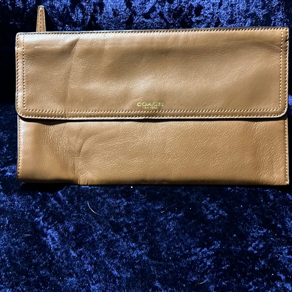 Coach Clutch never used